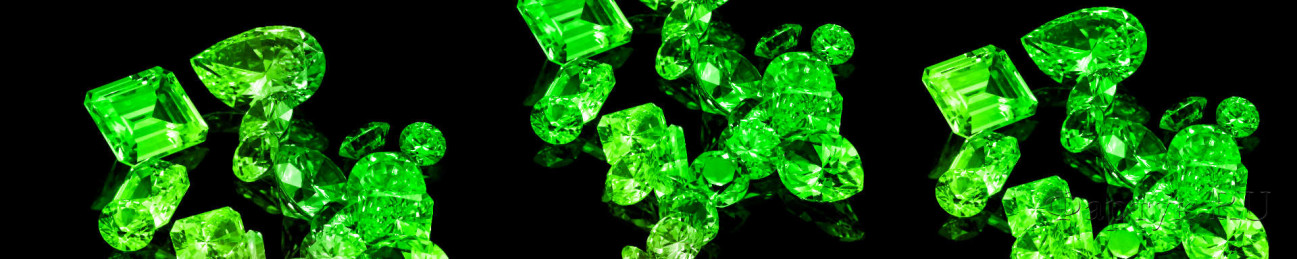 Скинали — Драгоценный камень зеленого цвета на черном фоне
