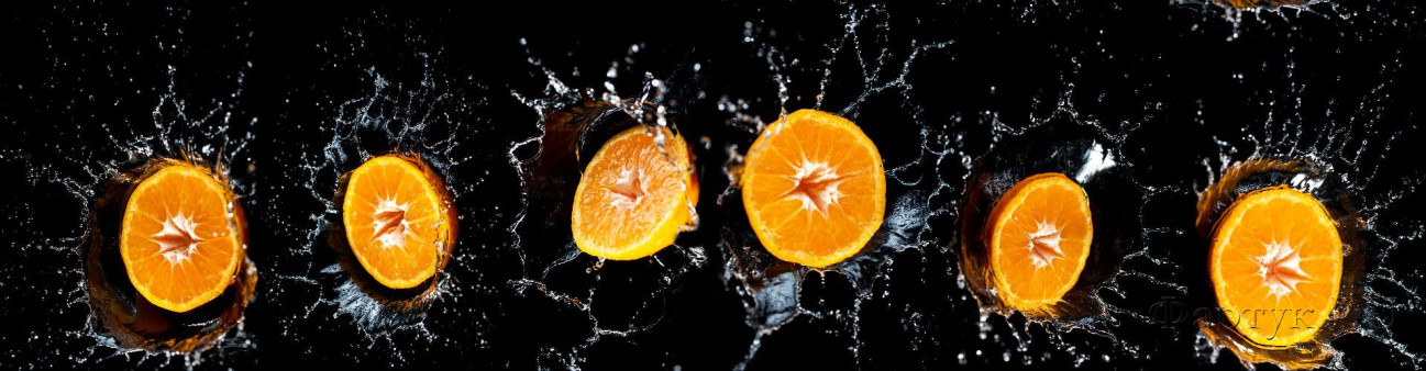 Скинали — Половинки апельсина и капли воды на черном фоне